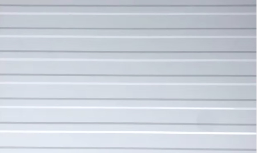 Mesa pattern aluminum siding — textured horizontal surface inspired by Southwestern design